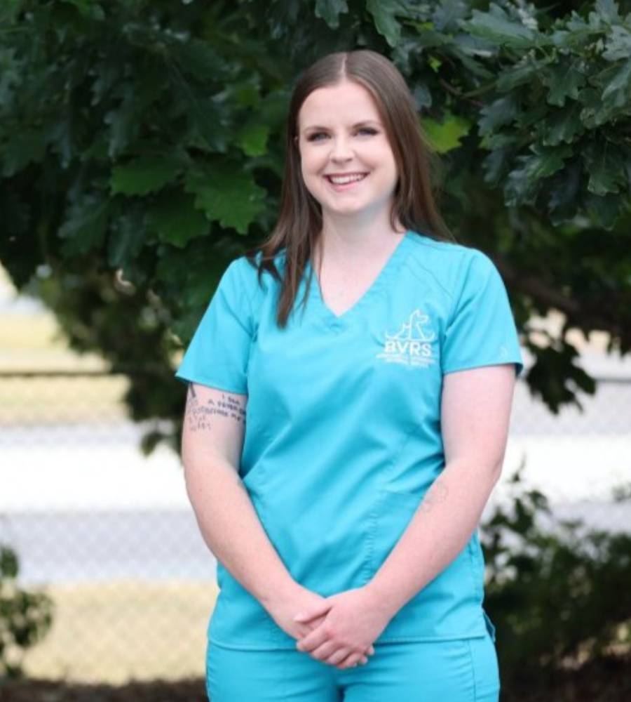 vet staff standing and smiling